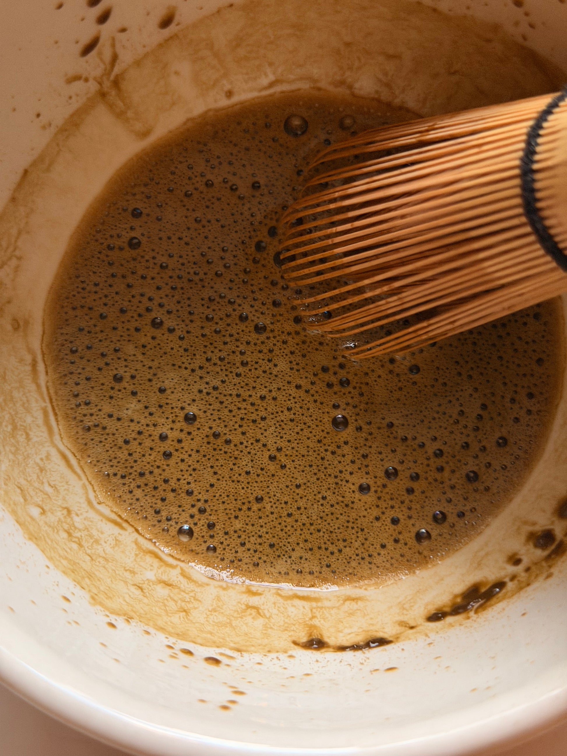 Whisked hojicha powder prepared in a traditional tea bowl. Shop Kamashh India