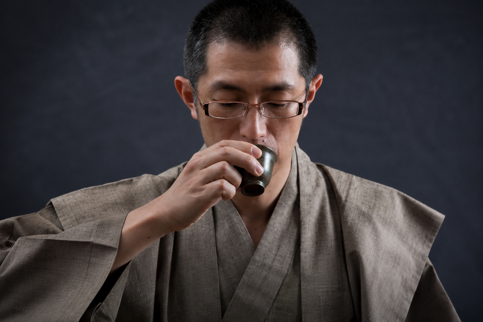 Japanese tea master tasting ceremonial grade matcha from a traditional chawan to evaluate umami, aroma and craftsmanship. Shop Kamashh India